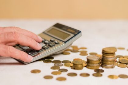 A person using a calculator.